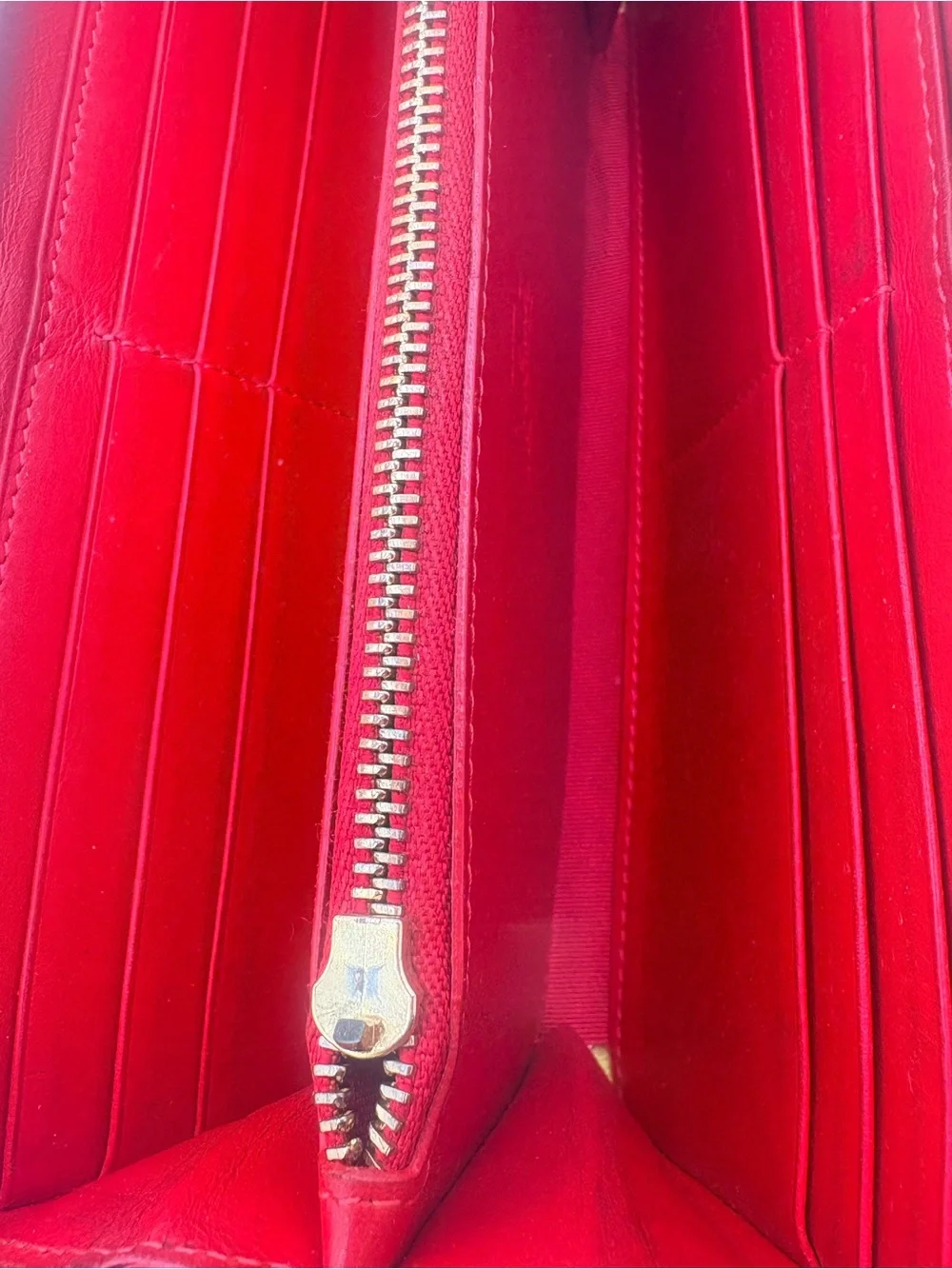 Christian Louboutin neon wallet